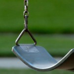 Two girls, an Uzi, and a playground